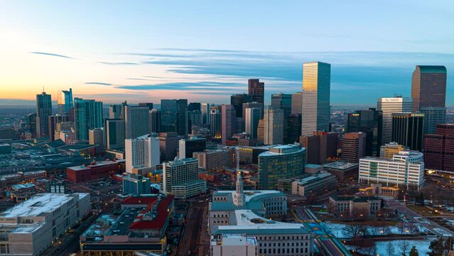 Golden triangle and epic downtown Denver skyline view; twilight drone hyperlapse