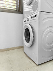 Modern washing machines in laundry room