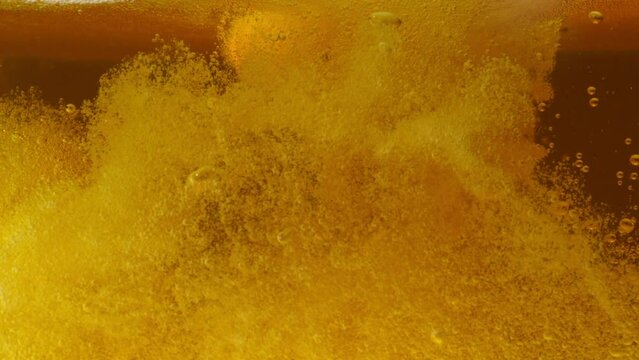 pour beer into a glass of beer, beer, soda, slow motion