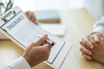 Loss Adjuster Insurance Agent Inspecting Damaged Car. .Sales manager giving advice application form document considering mortgage loan offer for car  insurance