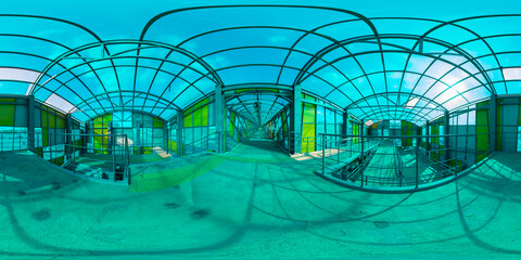 Panorama 360 degrees inside glass overhead passage tunnel.Full equirectangular projection for virtual reality or VR.