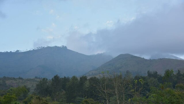 Clouds floating over Nilgiris mountains, Kodaikanal, Tamil Nadu, India