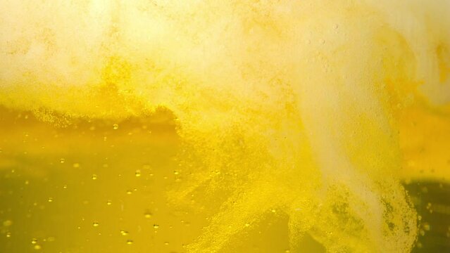 pour beer into a glass of beer, beer, soda, slow motion