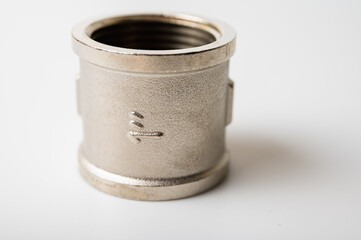 brass metal tee water adapters isolated on light background close up plumbing connections and details