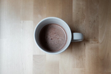 Hot chocolate drink in a white ceramic cup.