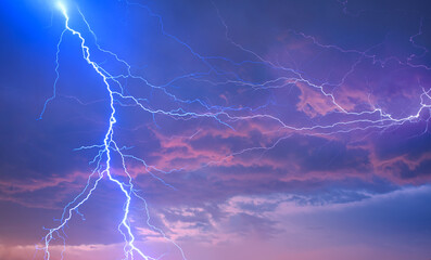 Beautiful landscape with lightning over the calm sea 