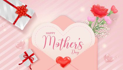 Open letter with heart shaped card saying Happy Mother's Day with bouquet of carnations and gift on pink background