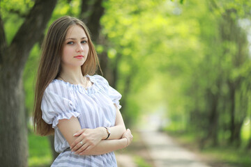 A girl in a spring green park