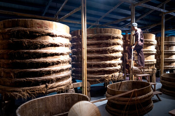 Image recreating the traditional way of making fish sauce of fishermen living in Phan Thiet sea...