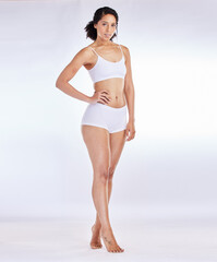 Fototapeta premium Underwear, black woman and body wellness portrait for beauty, body care or lose weight marketing. Natural, fitness and health figure of african girl model with white studio advertising mockup.