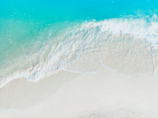 Aerial view with beach in wave of  turquoise sea water shot, Top view of beautiful white sand...