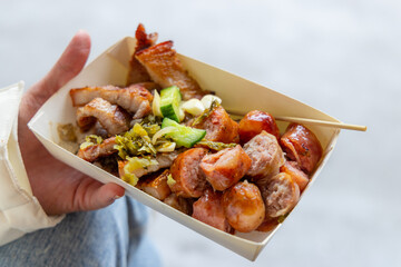 Grill sausage and grilled meat in paper box