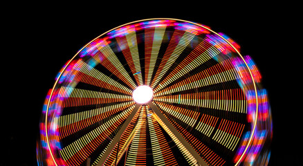 Long exposure of ferris wheel