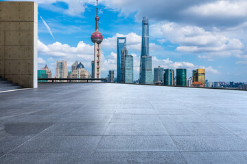 Fototapeta premium Empty square floor and city skyline with modern buildings in Shanghai, China.