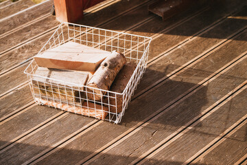 Portion of firewood is prepared for warming the home in winter. Wooden chunk for fireplace.