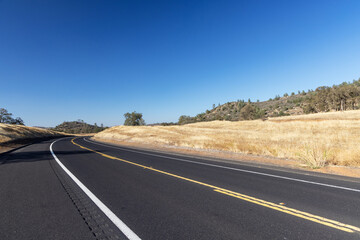 Asphalt road and countryside landscape