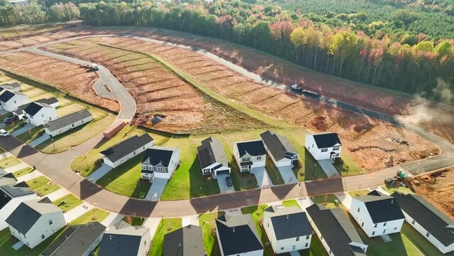 Aerial view of construction site with new tightly packed homes in South Carolina. Family houses as example of real estate development in american suburbs