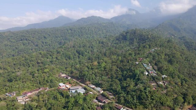 Circular shot of La Conquista village in San Marcos, Guatemala, revealing the valley in the distance.