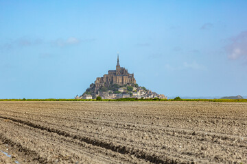 Fototapeta na wymiar View of the beautiful cathedral Le Mont Saint-Michel in Normandy, France, beautiful historic building, tourist place