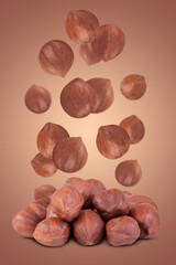 Levitation of hazelnut kernels on a dark background.