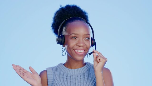 Black woman, call center and consulting for customer service in studio isolated on a blue background. Telemarketer employee, contact us or happy female consultant, sales agent or telemarketing worker