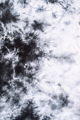 black and white tie dye pattern hand dyed on cotton fabric abstract texture background.