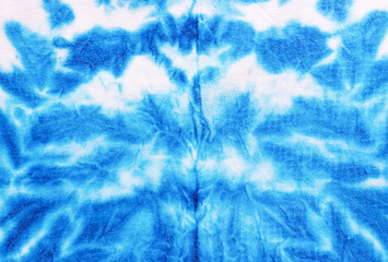sky blue tie dye pattern hand dyed on cotton fabric texture background.