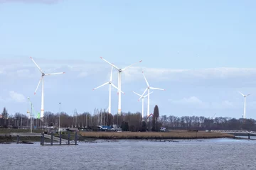 Foto op Canvas Wind turbines Wind turbines as alternative energy © rozaivn58