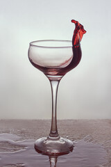 Red wine splash in a glass