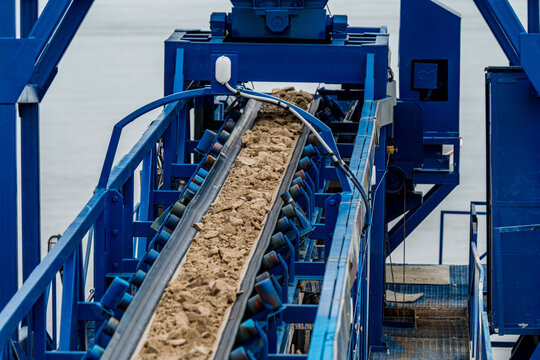 Industrial belt conveyor moving raw materials from mine