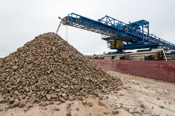 Industrial belt conveyor moving raw materials from mine