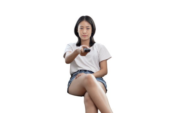 Woman holding a TV remote to switch channels or turn the TV on/off, Staying at home on weekends, Entertaining and relaxing by watching a movie or watching a game show, Hand pressing, Remote control.