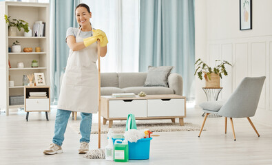 Happy woman cleaning home floor, house work and smile in home service mopping living room, job with...