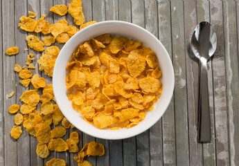 Delicious cereals in bowl with milk