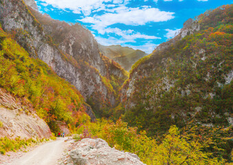 Gola dell'Infernaccio (Italy) - Gole dell'Infernaccio canyon and Eremo di San Leonardo sanctuary, in the Monti Sibillini National Park, Marche region, here with autumn foliage