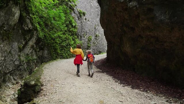 children hiking by the canyon