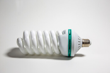 energy saving light bulb spiral on white background isolated