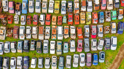 Fototapeta na wymiar Aerial view of a junkyard. Large parking lot of old, broken and demolished cars.