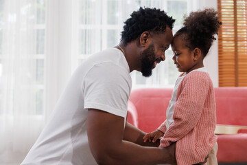 enjoy happy love black family african american father playing with his daughter little african girl...