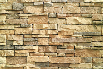 Front View of Rough Stone Blocked Wall in the Sunlight