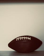 Rugby ball with white background. American soccer sport. Ball with space for text.