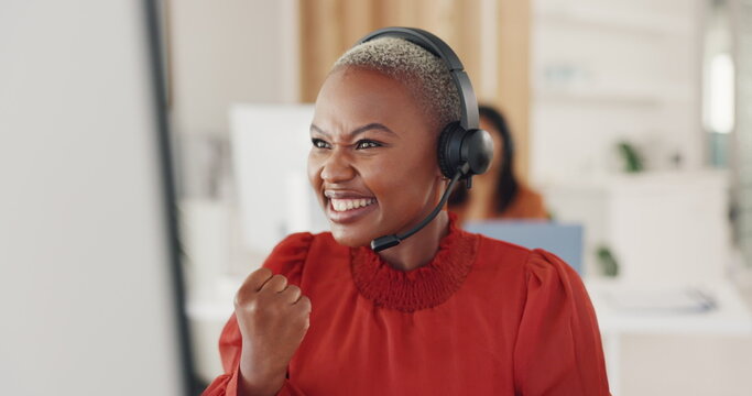 Winner, celebration and call center consultant in the office excited about a sale, job promotion or achievement. Happiness, celebrate and African female telemarketing agent with success in workplace.