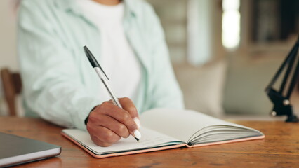 Hands, writing and notebook with a pen in the hand of a woman influencer live streaming a podcast from home. Idea, discussion and conversation with a radio presenter, reporter or female journalist