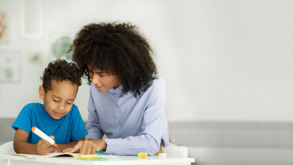Professional African-American language teacher, engaged with a preschooler, free space