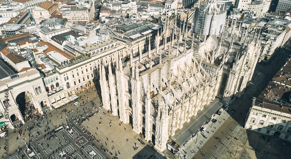 Wall mural aerial view of piazza duomo in front of the gothic cathedral in the center. drone view of the galler