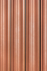 Texture of vertical iron red planks for interior decoration. Wallpaper background texture.