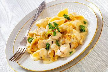 cheesy and creamy chicken and shells pasta bake