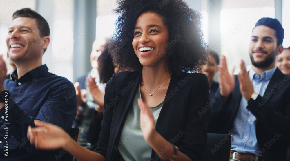Aufkleber the speaker knew how to target this audience. shot of a group of businesspeople clapping while atten