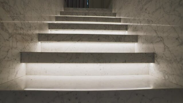 Staircase With Marble Design And Lights. Tracking Shot