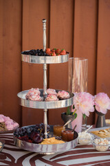 Catering wedding buffet with desserts and cupcakes, selective focus
